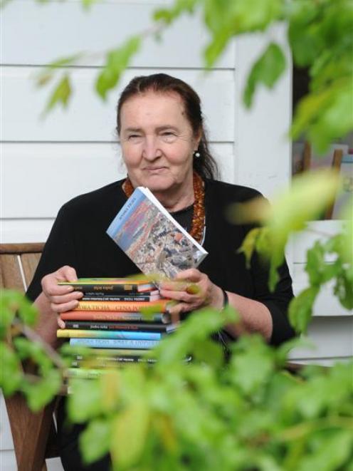 Dr Jindra Ticha at home in Dunedin with some of her published books. Photo by Nigel Benson.