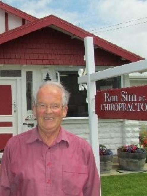 Dr Ron Sim outside the chiropractic practice which has been in family hands for 80 years. Photo...