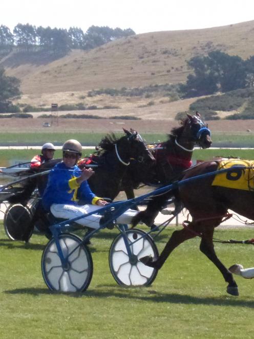 Driver Matthew Williamson gives a salute to members of  the Central Courage Syndicate after ...