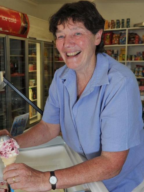 Marilyn Swinbourn rolls another ice cream during the  busy summer period. Photo by Gregor...
