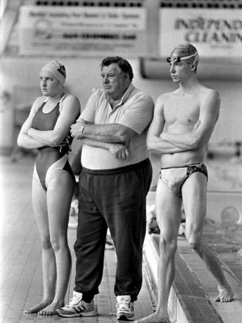 Duncan Laing with star pupils Anna Wilson and Danyon Loader at Moana Pool in 1994. Photo: ODT files.