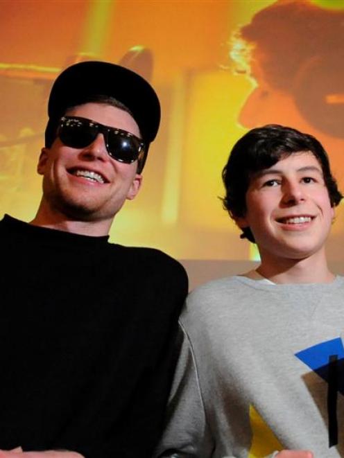 Dunedin 16-year-old James Mustapic (right) celebrates with science rapper Tom McFadden after...