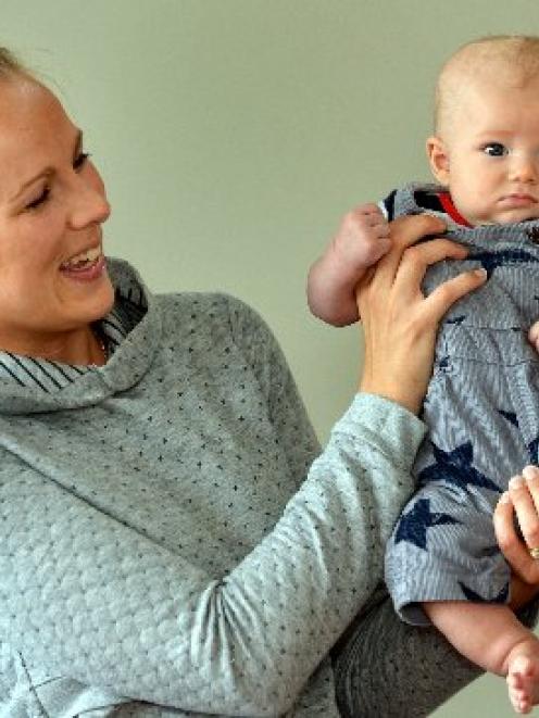 Dunedin 2-month-old Oliver Whaiunui is shown off by his mother, Rebekah. Photo by Peter McIntosh.