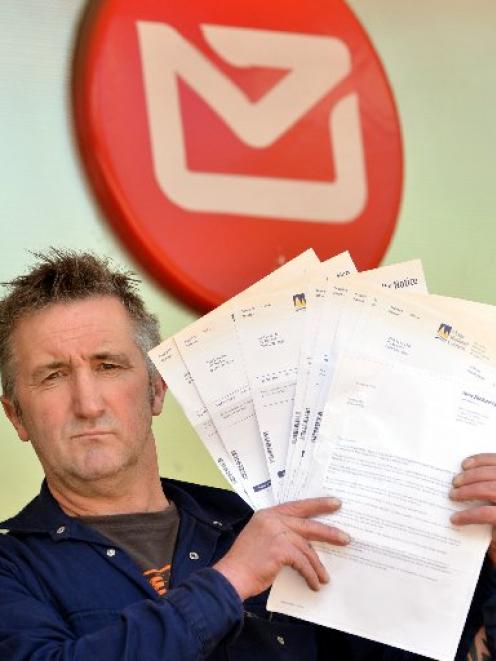 Dunedin businessman Lawrie Forbes is angry with the Otago Regional Council and New Zealand Post...