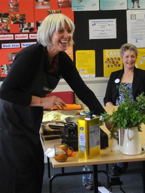 Dunedin chef and food writer Judith Cullen demonstrates a healthy recipe to canteen staff in...