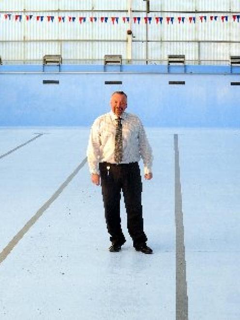 Dunedin City Council energy manager Neville Auton at Port Chalmers pool, one of three community...