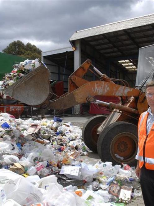 Dunedin City Council Water and Waste Services solid waste manager, Ian Featherston, with some of...