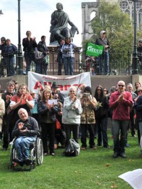 Dunedin City councillor Aaron Hawkins addresses people at a public protest over the Trans Pacific...