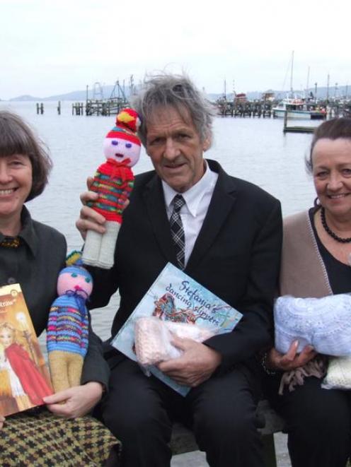 Dunedin City Councillor John Bezett (centre) pictured with Dunedin Polish Society president...