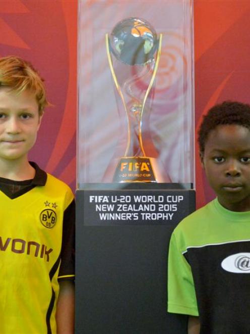 Dunedin football fans Finn Bielski-Cook (10, left) and Francis Potts (8) with the Fifa Under-20...