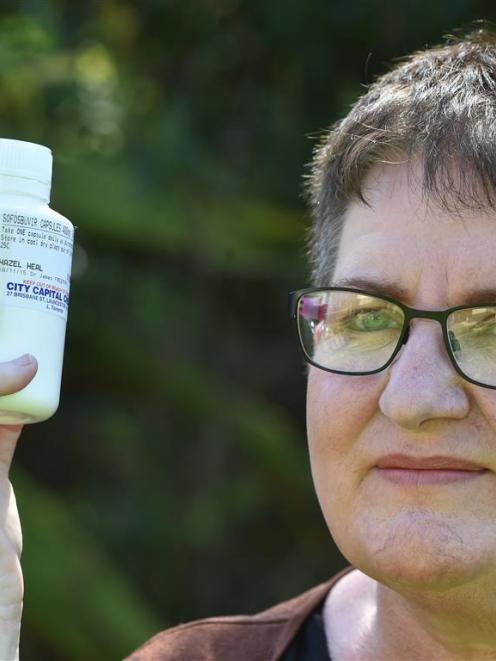Dunedin law student Hazel Heal with drugs she sourced in Australia to cure her hepatitis C. Photo...