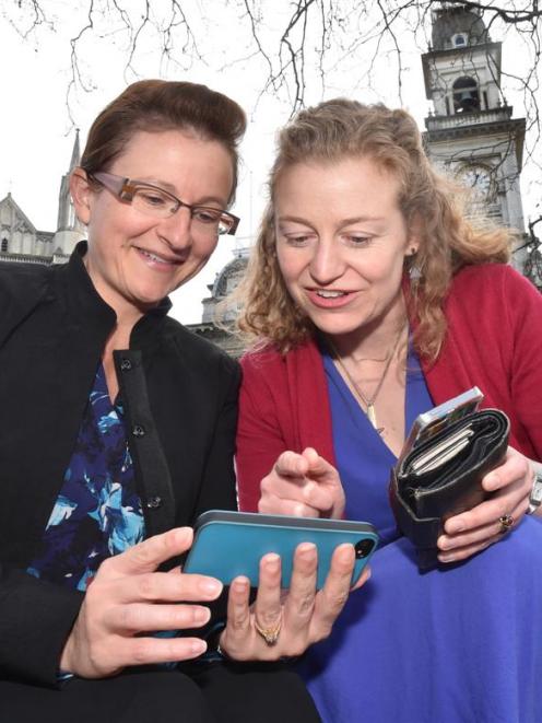 Dunedin lawyers Jackie St John (left) and Rachel Brooking test the Octagon's new gigabit Wi-Fi...