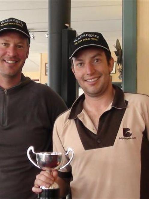 Dunedin man Guy Wilson holds the King of the Hill trophy he won during Sunday's third Black Gold...