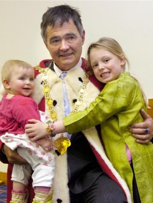 Dunedin Mayor Dave Cull is congratulated by granddaughters Carli (left) and Kaia Hutchison...