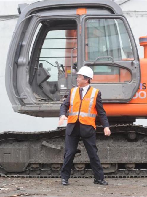 Dunedin Mayor Peter Chin after an eventful turn at the controls of an excavator yesterday. Photo...