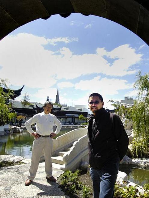 Dunedin Mayor Peter Chin (left) visits the Chinese Garden yesterday, with his replacement as...