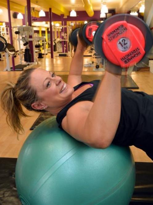 Dunedin mother Tash Columbus gets active at the the gym.  She spends about 14 hours a week...