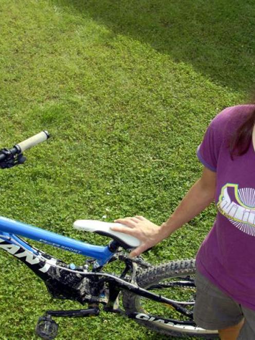Dunedin mountain biker Sheryl MacLeod is recovering at her Pine Hill home after breaking her neck...