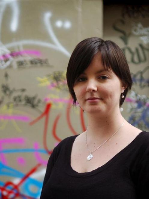 Dunedin's new graffiti education officer Nicole Kettings surveys tagging in Albion Lane, Dunedin....