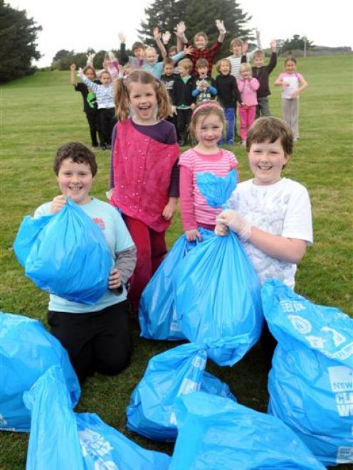 Dunedin's Rotary Park School pupils (front, from left) Nathan Farr (9), Ellie Jones (6), Ella...