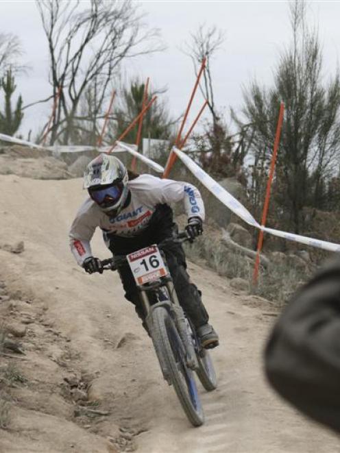 Dunedin's Sheryl MacLeod (inset) in action in the women's downhill at the Canberra World Cup...