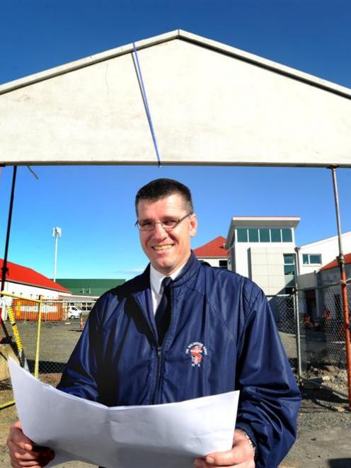 Dunedin Salvation Army Glenn Anderson studies plans for a redevelopment of the central city site,...