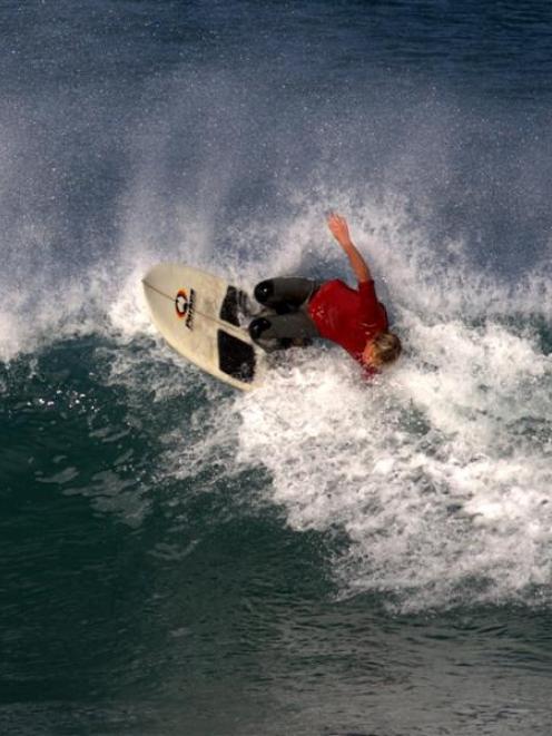 Dunedin schoolboy Geordi Dearns in action in the under-16 event at the world kneeboard...
