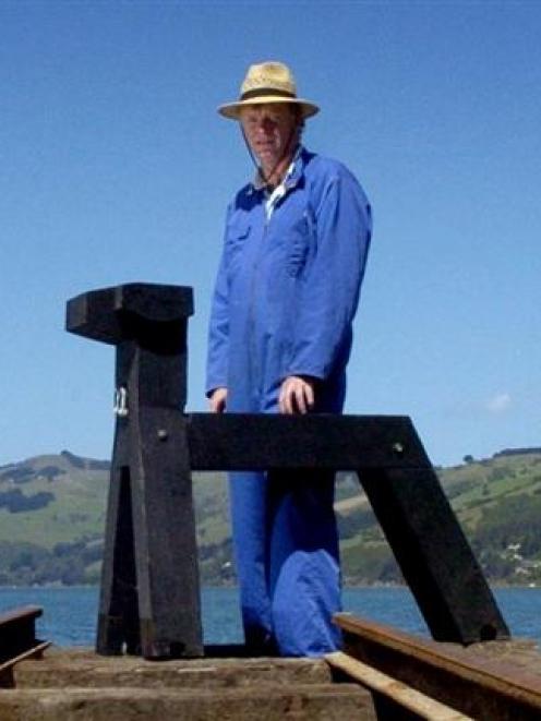 Dunedin sculptor Stephen Mulqueen with a scale model of the Kuri/Dog, erected at Dunedin's Boat...