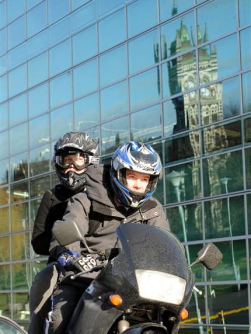 Dunedin students Thomas Gee (rider) and sister Hannah (pillion) say two wheels are better than...
