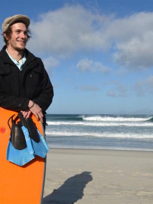 Dunedin surfer Brendan Ford back at Dunedin's St Kilda Beach, where he rescued a swimmer earlier...