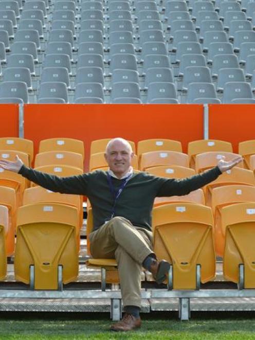 Dunedin Venues Management Ltd chief executive David Davies tests temporary seats in front of the...