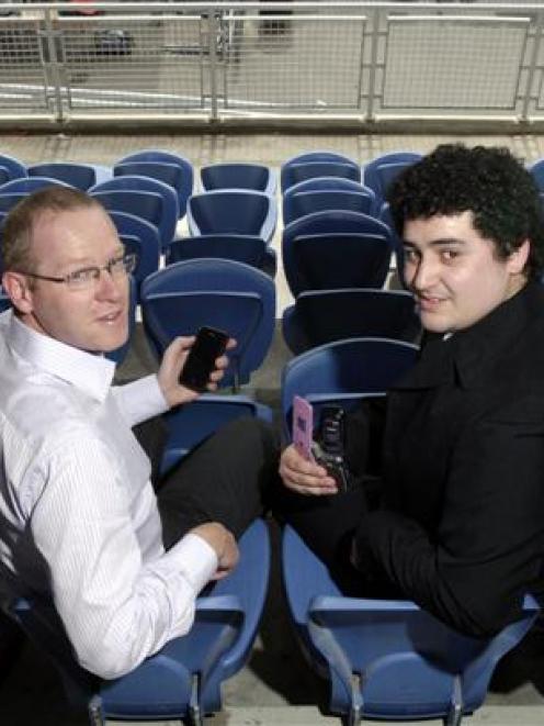 Dunedin Venues Management Ltd operations manager Darren Burden (second from left) studies the...