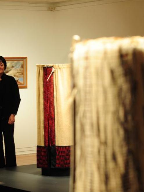 Dunedin weaver Rokahurihia Ngarimu-Cameron with her collection of korowai (Maori cloaks) on...