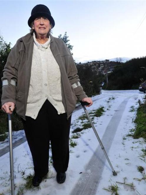 Dunedin woman Francis Ramsay cannot leave her hill suburb home because of snow and ice in the...