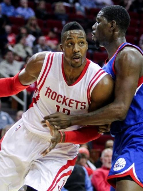 Dwight Howard (12) in action recently for the Houston Rockets against the Philadelphia 76ers...