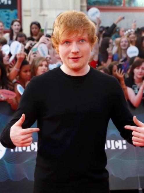 Ed Sheeran arrives on the red carpet at the MuchMusic Video Awards in Toronto earlier this month....