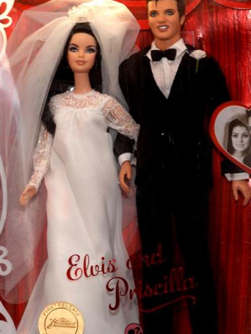 Elvis and Priscilla Barbie dolls are displayed for sale at Graceland in Memphis. (AP Photo/Greg...