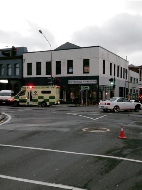 Emergency services  attend a vehicle crash in central Dunedin yesterday.  Photo supplied.