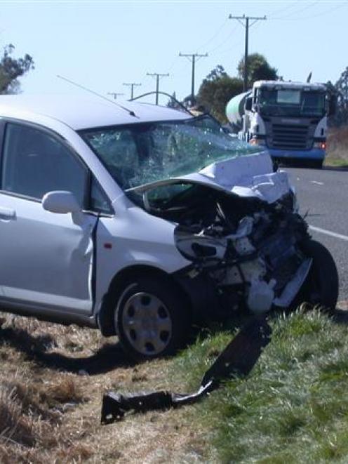 Emergency services attend an accident on State Highway 1, north of Oamaru, in which Allan and...