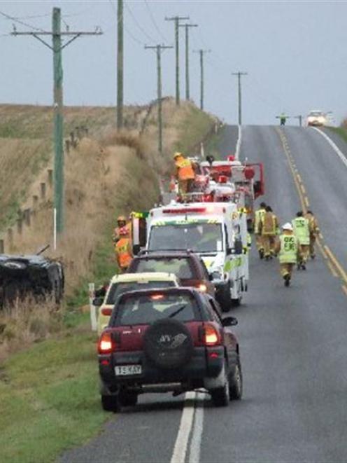 Emergency services from Clinton and Balclutha attend the scene of an accident on State Highway 1,...