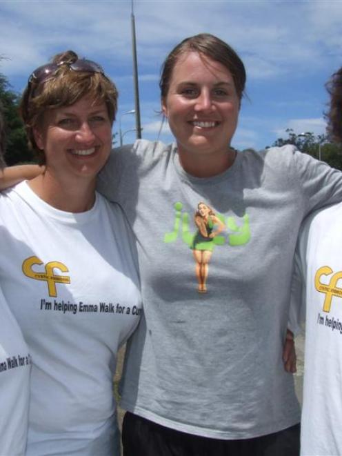 Emma Daken (second from right), who is walking the length of New Zealand, and supporters (from...