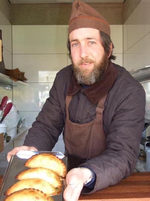 Empanada Kitchen's Mauro Viale with some of his wares. Photo by Christina McDonald.