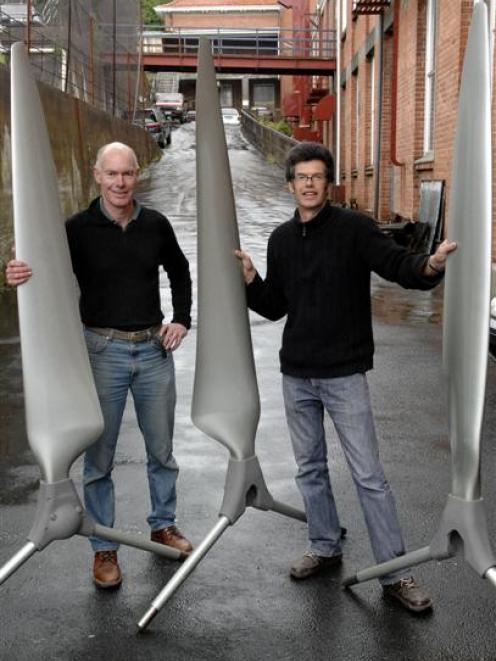 Engineers Bill Currie and Wayne O'Hara aim to have three of their unusual one-bladed wind...