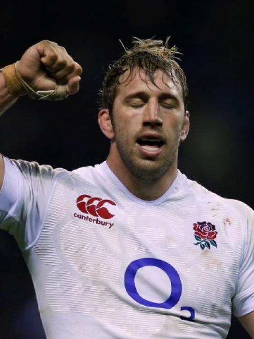 England captain Chris Robshaw celebrates defeating France in their Six Nations rugby match at...