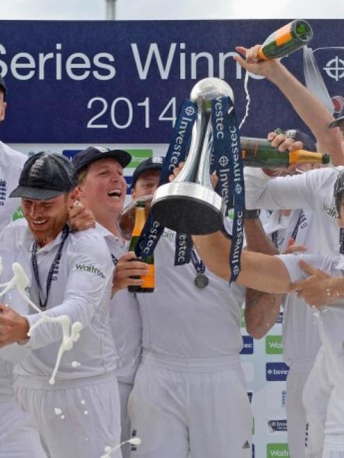 England players celebrate their series win over India at the Oval in London. REUTERS/Philip Brown