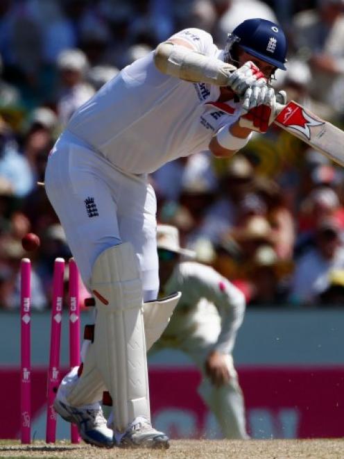 England's Boyd Rankin is bowled by Australia's Mitchell Johnson. REUTERS/David Gray