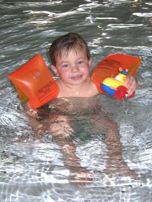 Enjoying a reopened Molyneux Aquatic Centre in Alexandra yesterday is Canadian 2-year-old Alex...