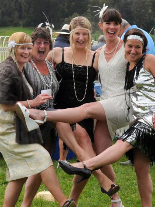 Enjoying  the Boxing Day races at Wingatui yesterday are (from left) Liz Dougherty, Linda Hassan,...