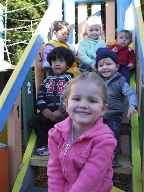 Enjoying the playground at Enfield Play Group are (clockwise from front) Abby Rowland (4),...