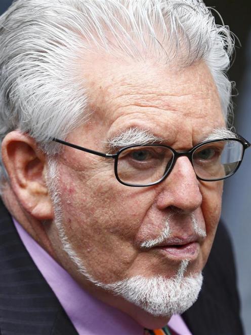 Entertainer Rolf Harris has been accused of abusing a  girl for her entire teenage and young...